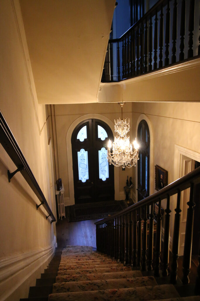 chandelier and staircase at The Banker's House in Shelby, North Carolina
