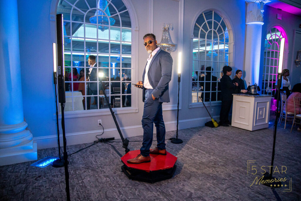 Man in suit having his photo taken on the photo booth